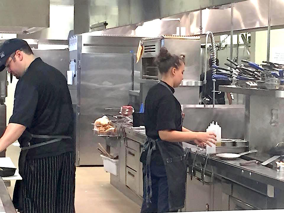 Customers are welcome to see just what's cooking in the kitchen at Manna.
