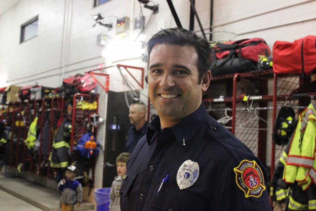 Lieutenant Cameron Nelson spoke with residents at the open house at station 153.