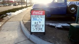 The new sandwich board sign on the west side of the street is hidden from traffic traveling north on Wilcox. Angel proposed that he be allowed to have a more visible sign on the east side of the street, near the library.